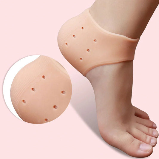 Perforated silicone heel protector in white, showing medical-grade material and breathable design