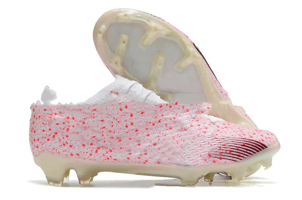 Men's waterproof football shoes with air cushion and FG studs for grass surfaces