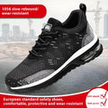Black steel-toe safety shoes for men on a work site background