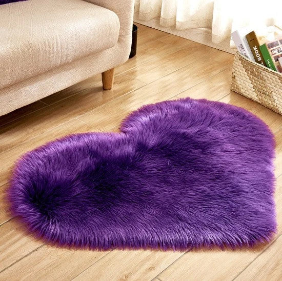 Soft, plush heart-shaped rug in various colors and sizes for comfortable home decor