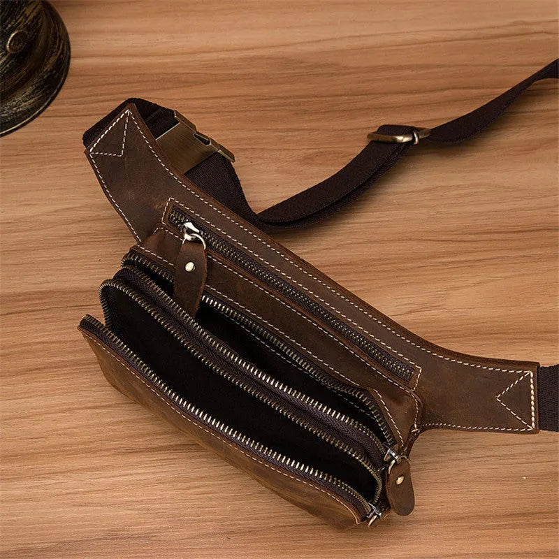 Brown top layer cowhide men's sports waist bag showing pull closure and dimensions.