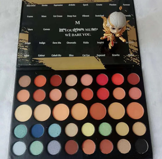 39-colour earth tone eyeshadow palette showing pearlescent and matte finishes in compact with mirror