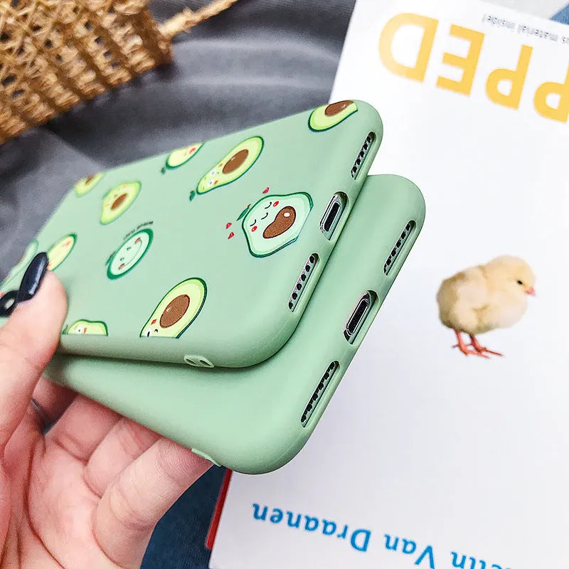 Green cartoon avocado design on a flexible black TPU phone case for iPhone.