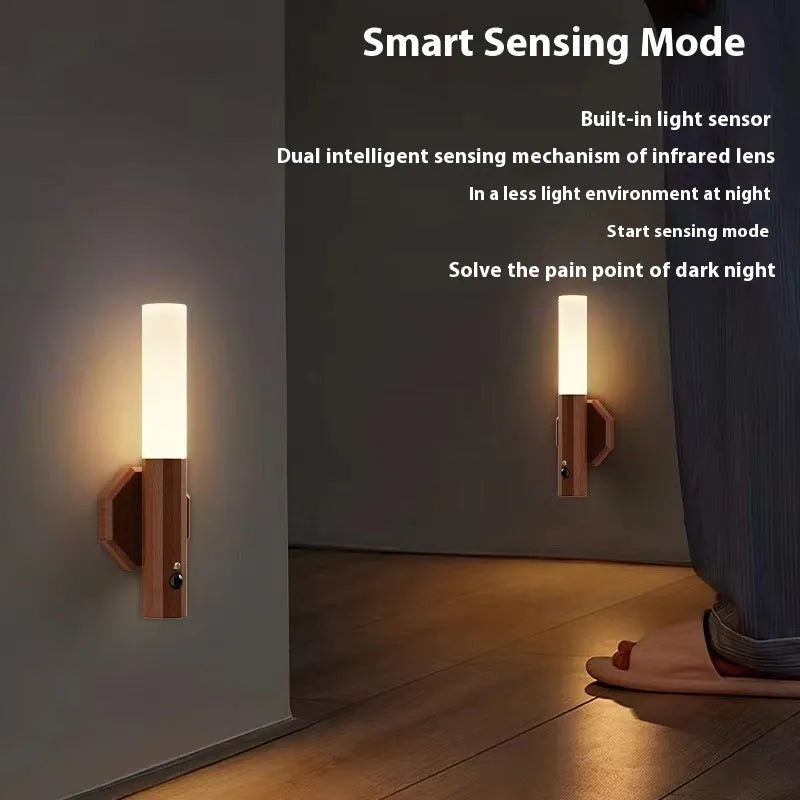 LED wood grain magnetic wall lamp with motion sensor on a white wall showing warm glow from frosted glass lampshade