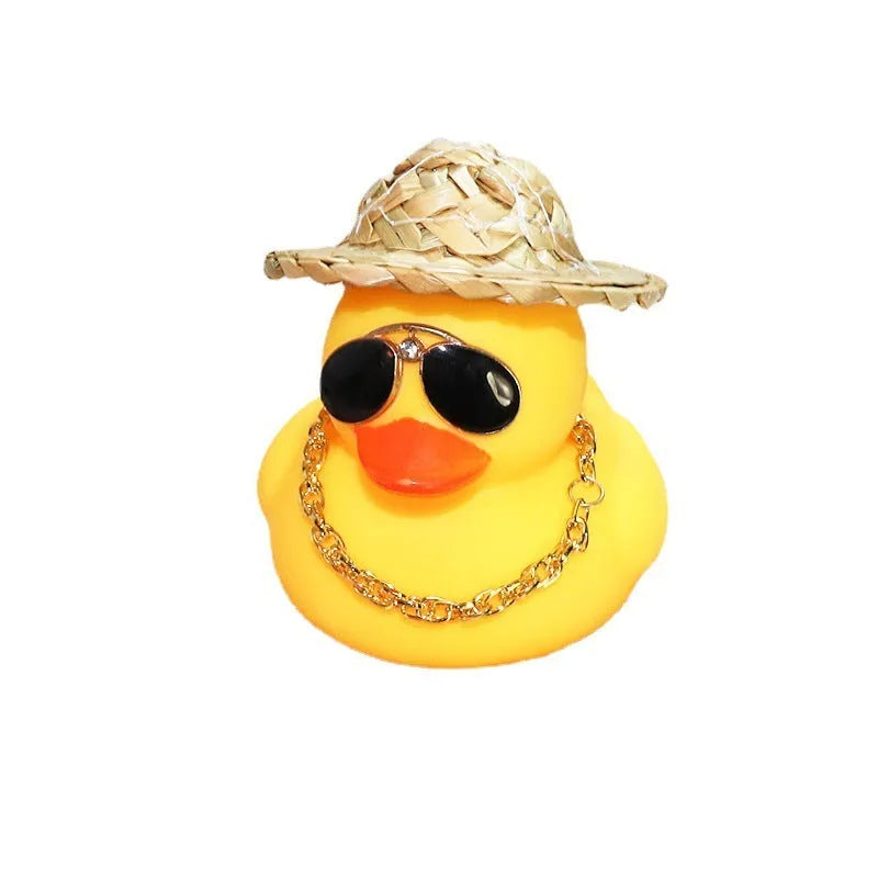 Yellow cartoon duck wearing a straw hat car decoration with adhesive glue and sunglasses accessory.