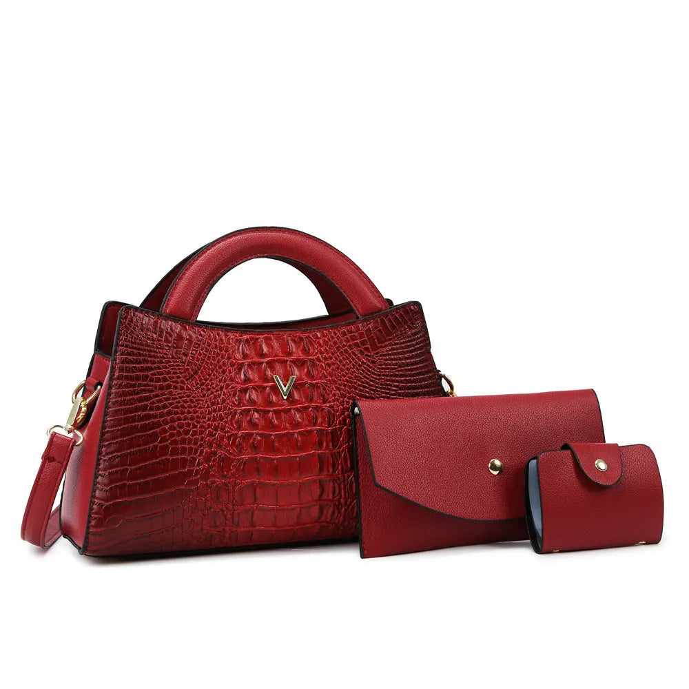 Women's crossbody handbag in crocodile pattern PU leather showing internal organisation compartments