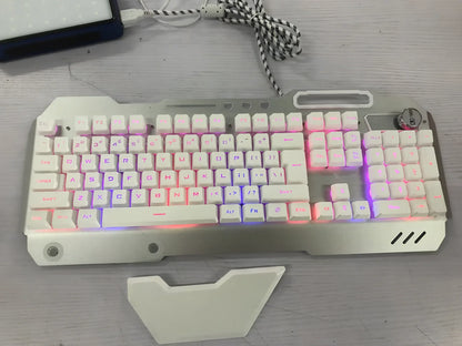 Black wired gaming keyboard with RGB backlight, phone holder, and magnetic wrist rest on desk