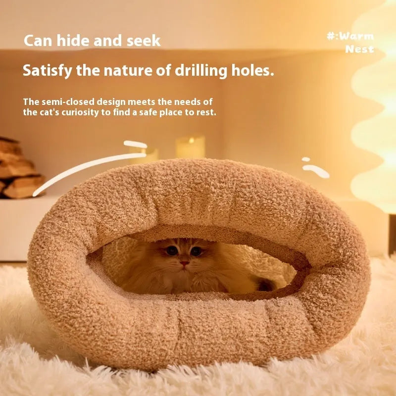 Brown semi-enclosed pet sleeping bag with lambswool insulation on wooden floor