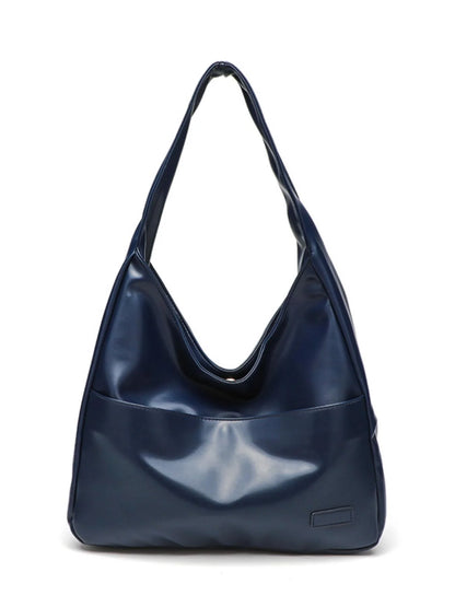 Large capacity PU tote bag for women in brown, black, and white with sewing thread detailing