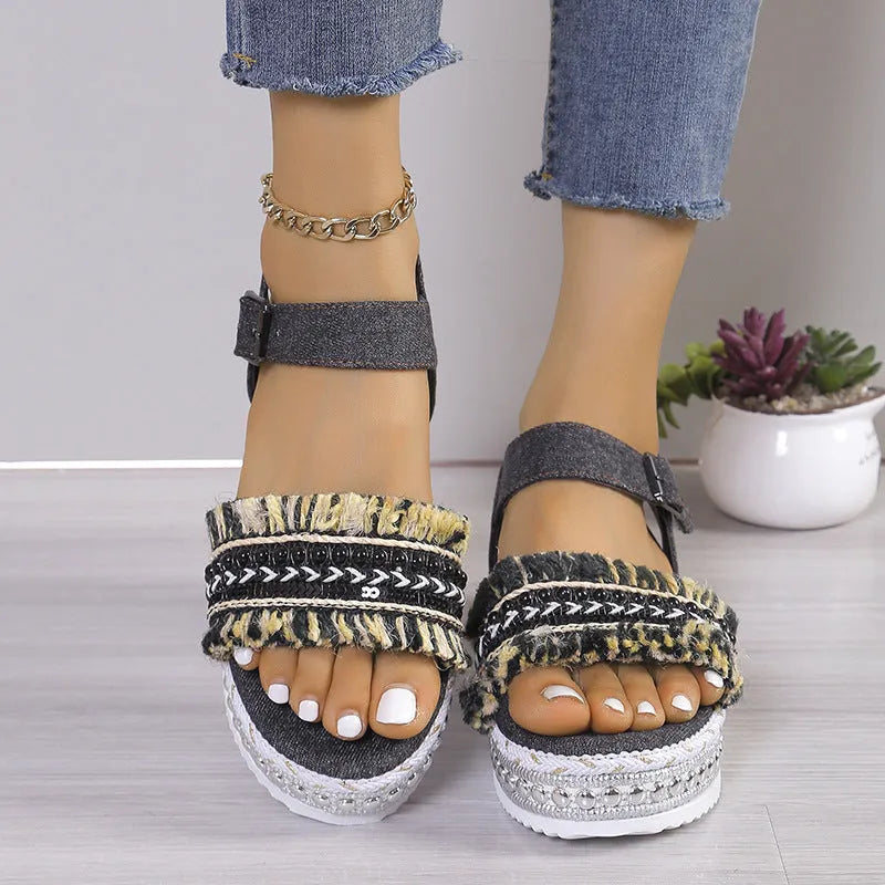 Women's tassel denim sandals with thick flat sole and buckle closure in blue