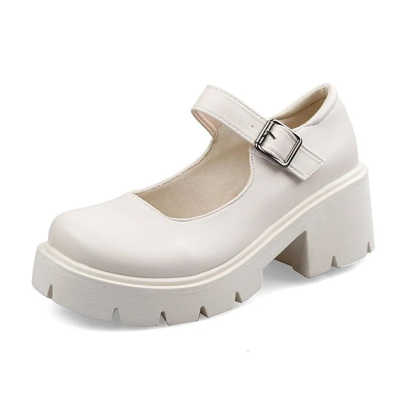 Women's British style buckle patent leather low heel shoes in beige with round toe and rubber sole