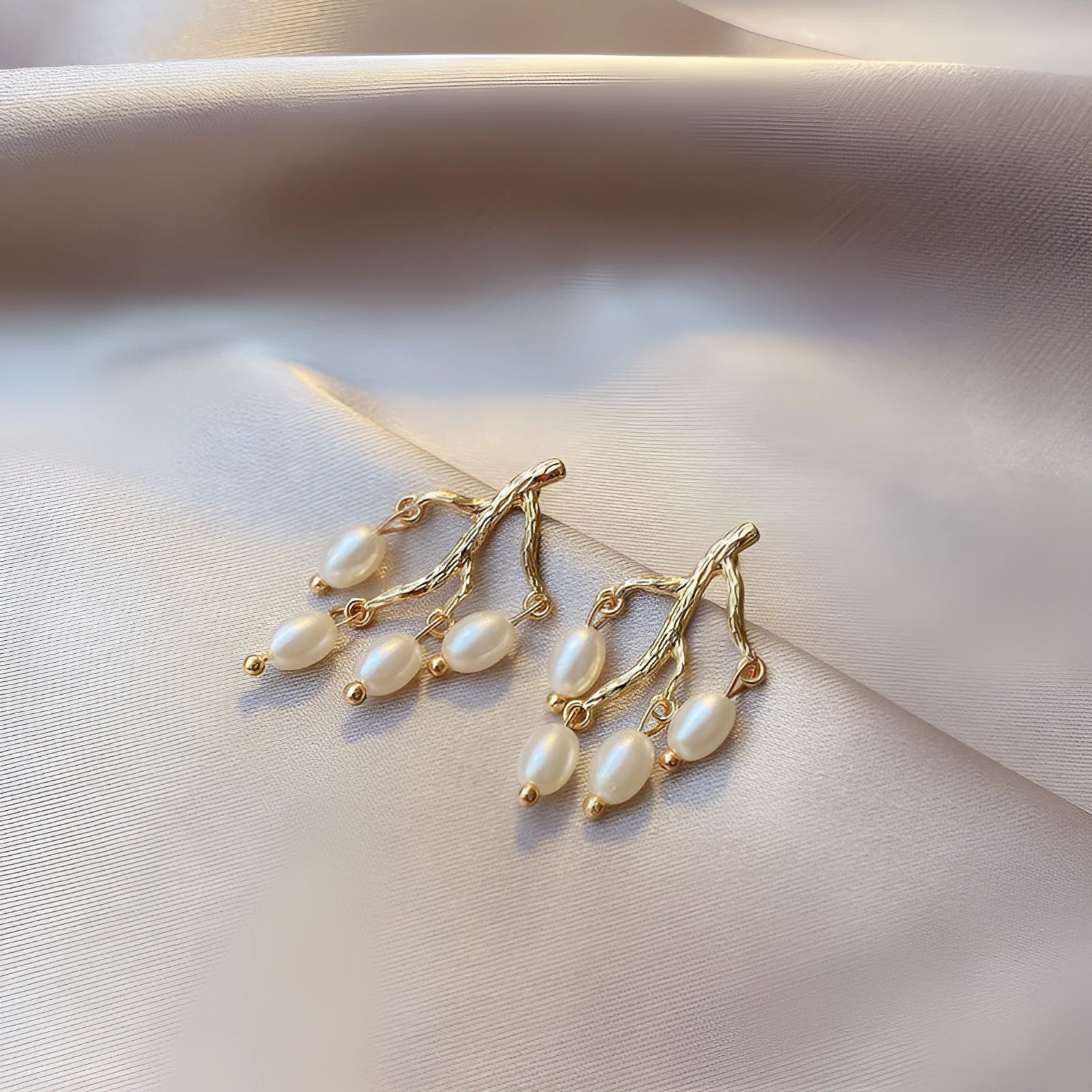 Pearl branch earrings for women, alloy silver gold finish, pearl inlay flower shape, white colour dangle drop earrings