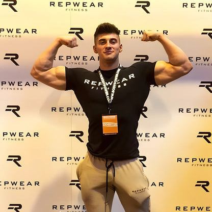 Slim-fit quick-drying stretch short-sleeve t-shirt in black with embossed letter prints, round neck, sizes M-XXL