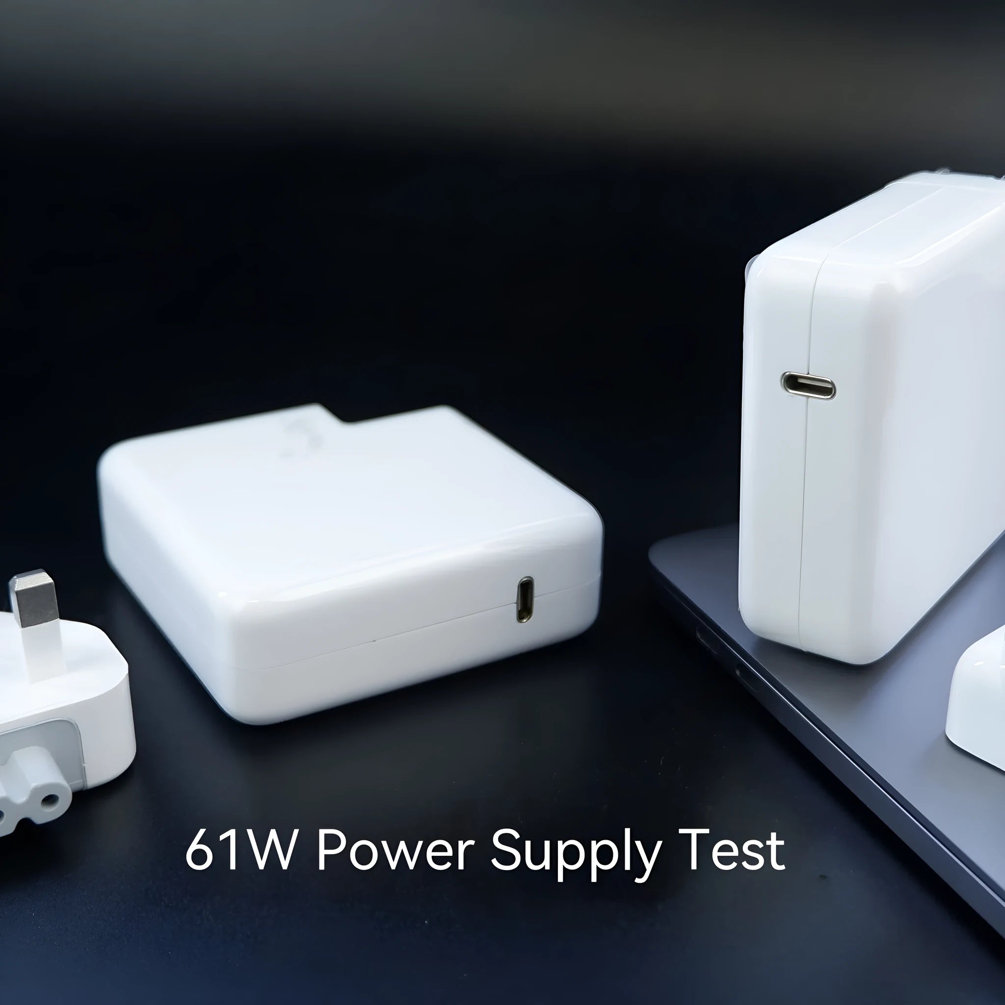 61W laptop power adapter with UK plug measuring 7x7x3cm