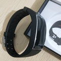 Smart watch with OLED touch display and silicone wristband on a wrist, showing heart rate monitoring screen