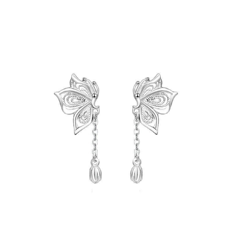 Women's S999 Sterling Silver Butterfly Tassel Earrings showcasing intricate design and shine