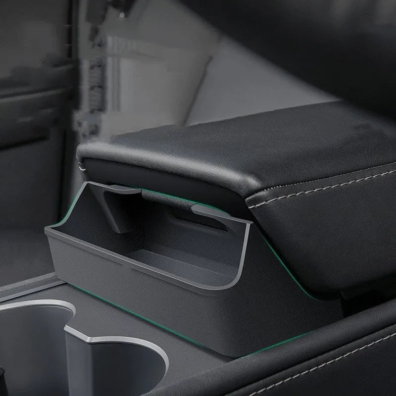 Black silicone glasses case mounted in Tesla Model 3/Y centre console