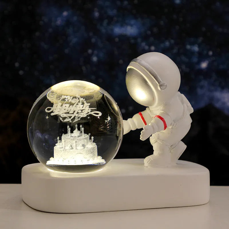 Glowing astronaut crystal ball night light with 6cm resin sphere showing planetary pattern
