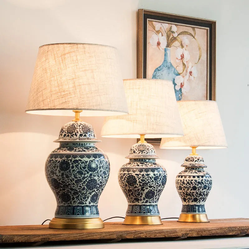 Blue and white Chinese porcelain table lamp with handmade cloth shade on copper base