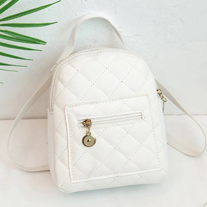 Girls' Korean style embroidery backpack in PU material with hard case construction measuring 16x7x19cm