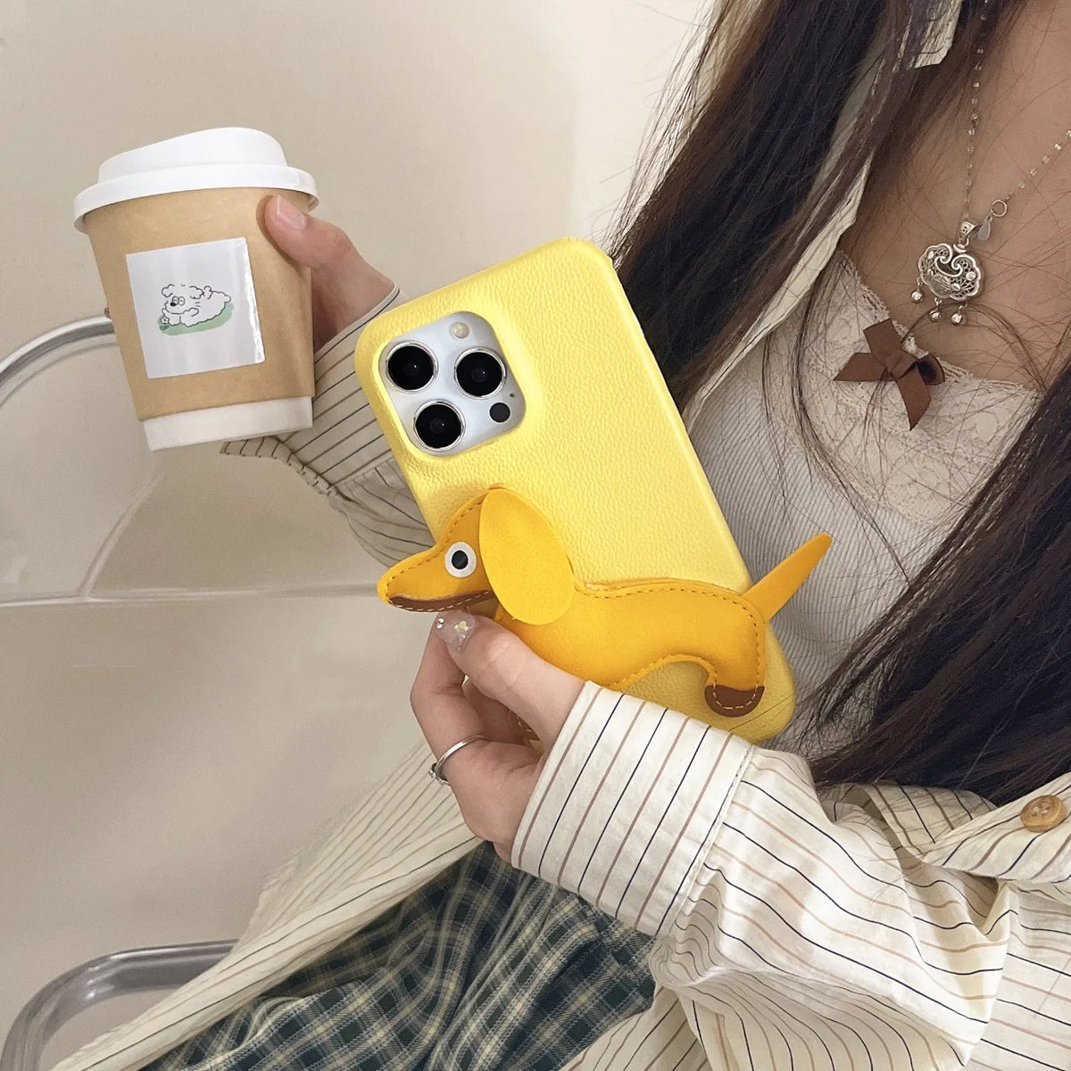 Creative three-dimensional leather sausage dog phone case for Apple iPhone in yellow