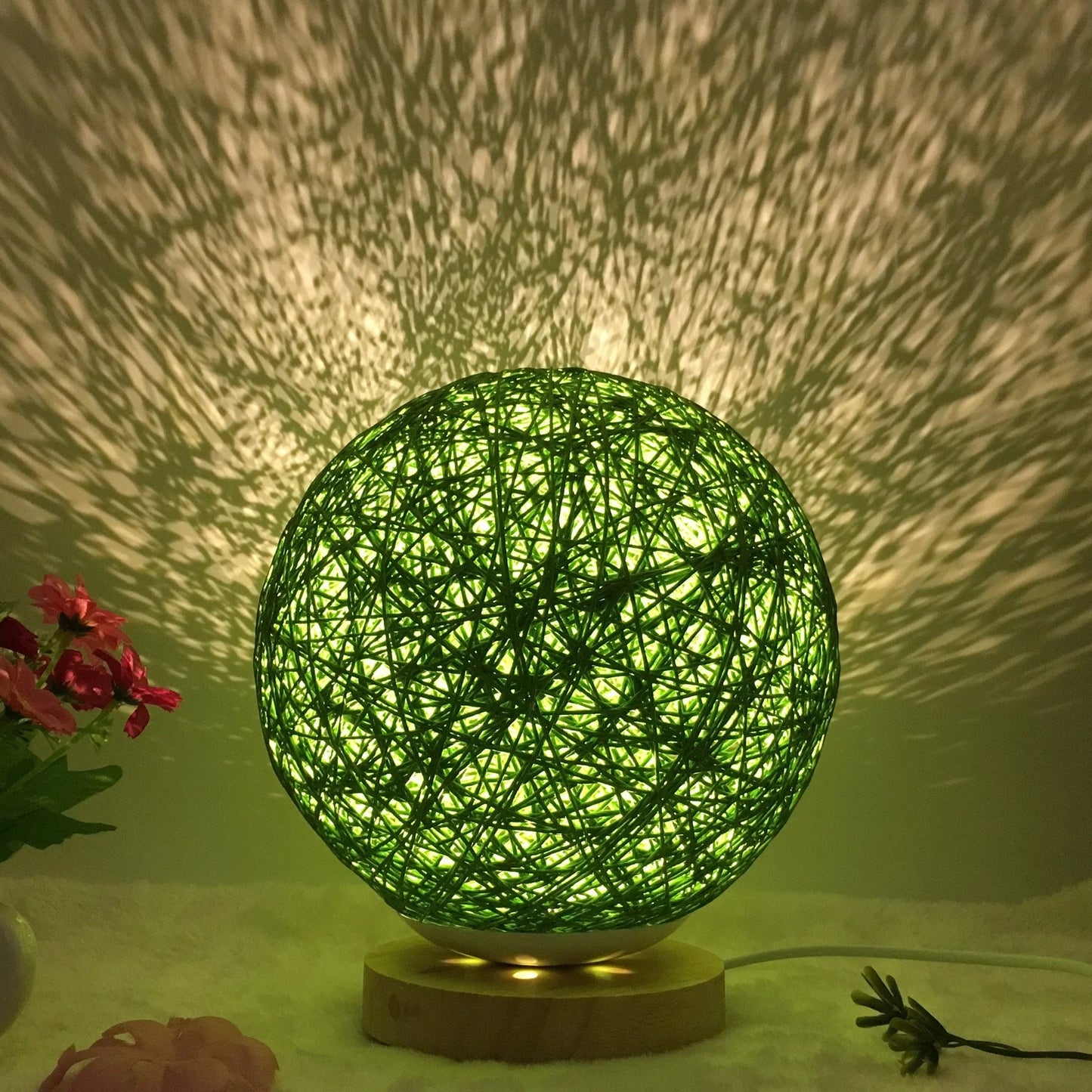 LED rattan table lamp with hand-knit lampshade in various colours