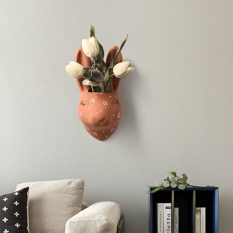 Ceramic animal-shaped wall vases in rabbit, brown bear, and giraffe designs for stylish home decor