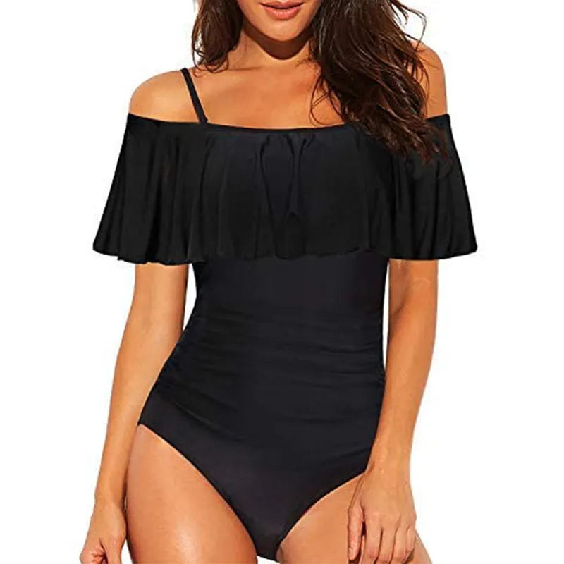 Black one-piece swimsuit with cut-out sides and ruffled strap tube top design