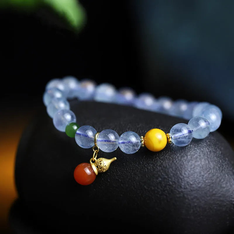 8mm aquamarine crystal bracelet with geometric design and ethnic retro styling in iced aquamarine colour