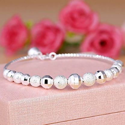 Adjustable copper plated silver bell transfer bead bracelet for women