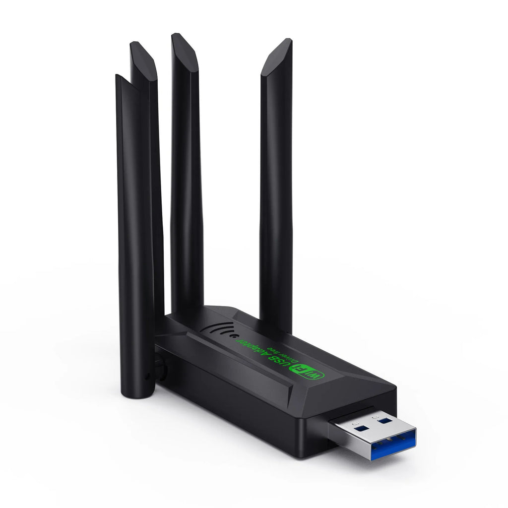Black USB network transmitter with four extended antennas for computer wireless connectivity