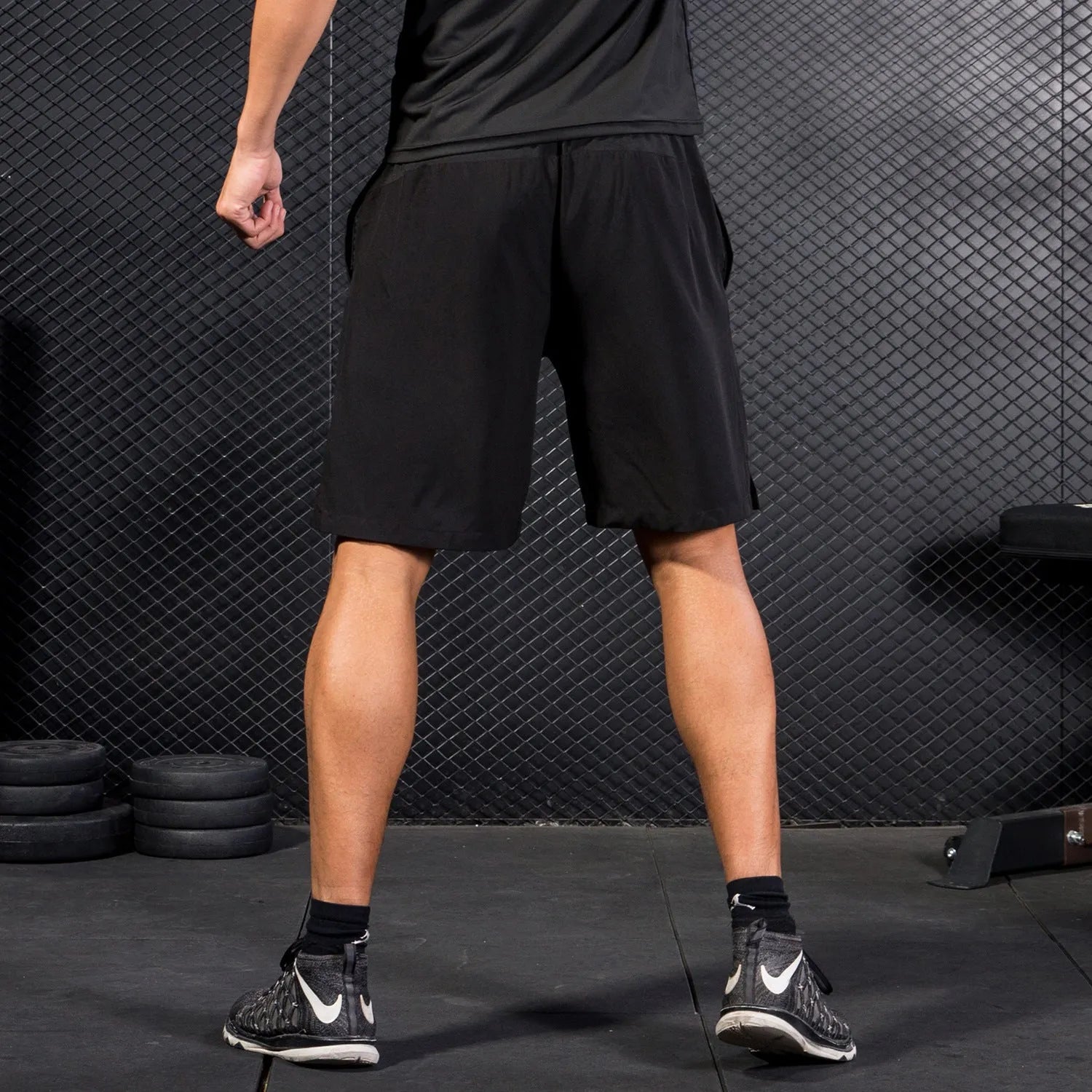 Men's reflective basketball shorts in camouflage and stripes pattern, black colour, polyester fibre