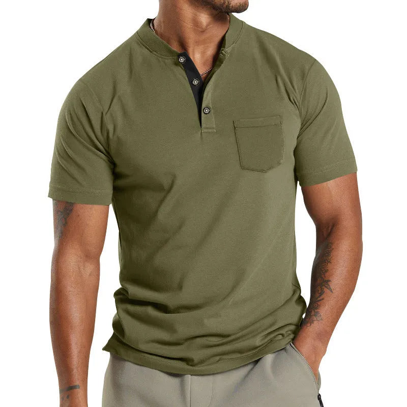 Plus size man wearing a light grey short sleeve polyester casual shirt with a button chest pocket.