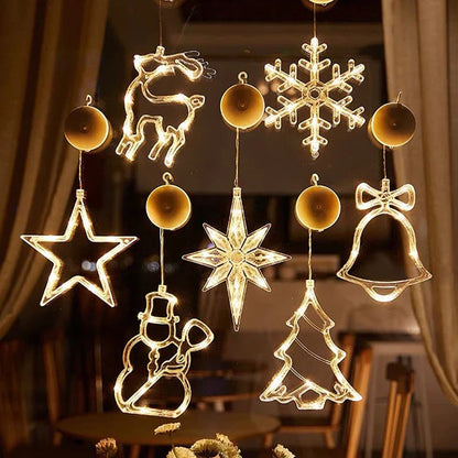 Festive LED Suction Cup Chandelier Lights with various holiday designs including snowmen, reindeer, and stars