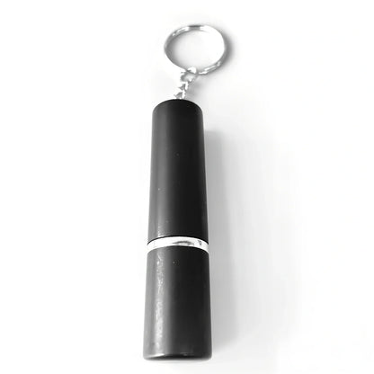 Black self-defence keychain set with alarm, bottle opener, and multiple protection tools