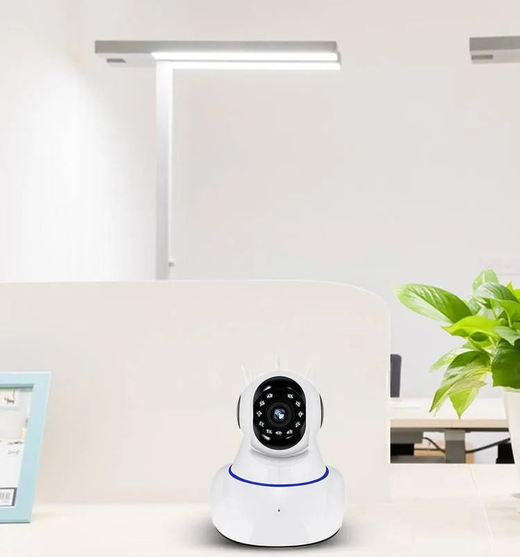 White wireless dome security camera with a 3.6mm lens for indoor and outdoor HD monitoring.