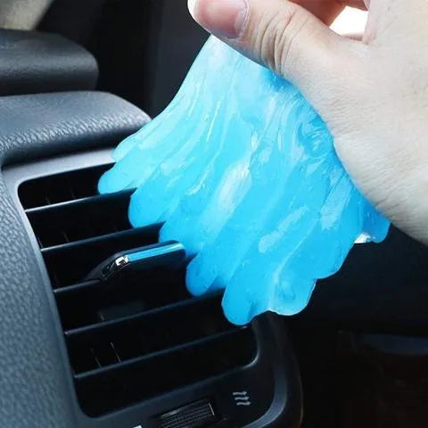 Blue and yellow Magic Cleaning Gel tubes for household and car dust removal.