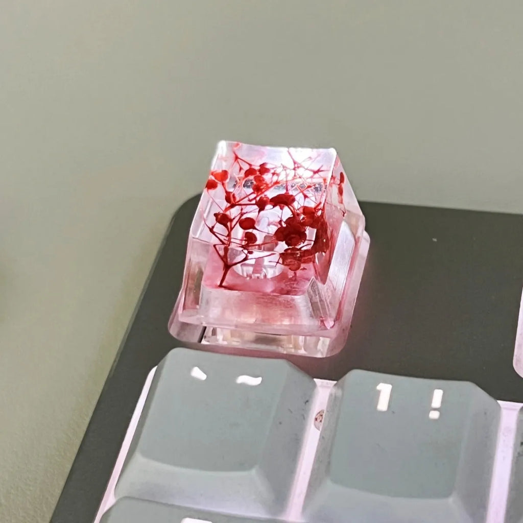High transparency resin starry sky keycap for mechanical keyboard in green, pink, red, and violet colours.