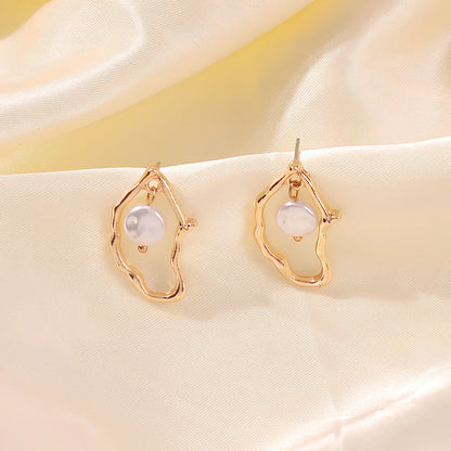 Gold alloy irregular pearl earrings with European-American styling for women