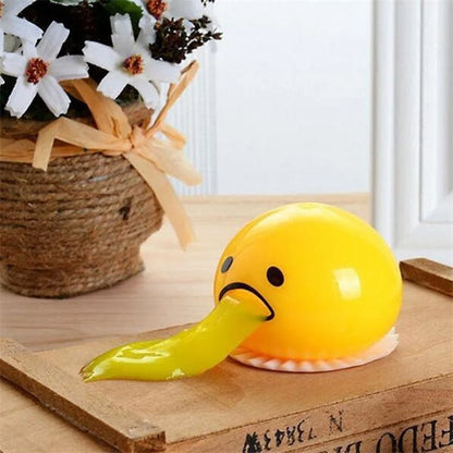 Gudetama Vomiting Egg Toy in green, orange, pink, and yellow