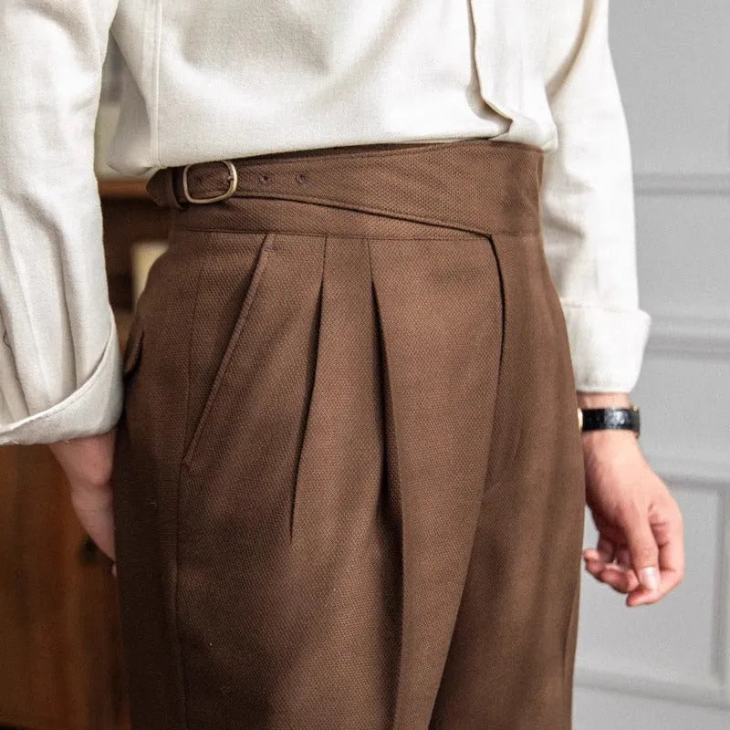 Men's high-waisted straight-leg casual trousers in black polyester fabric on a hanger.