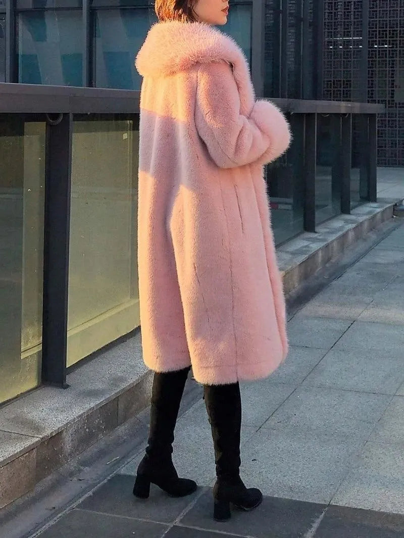 Women's grey mid-length leather coat with a thick white faux fur collar