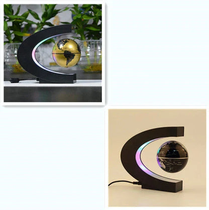 Magnetic levitation globe floating above base with LED light on