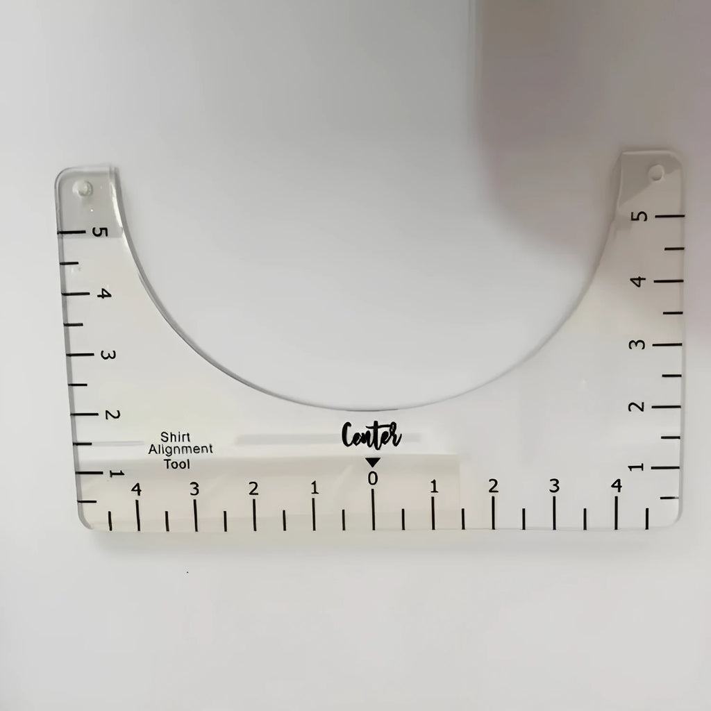 Transparent acrylic sewing ruler patch for T-shirt alignment, 10x6 inches.
