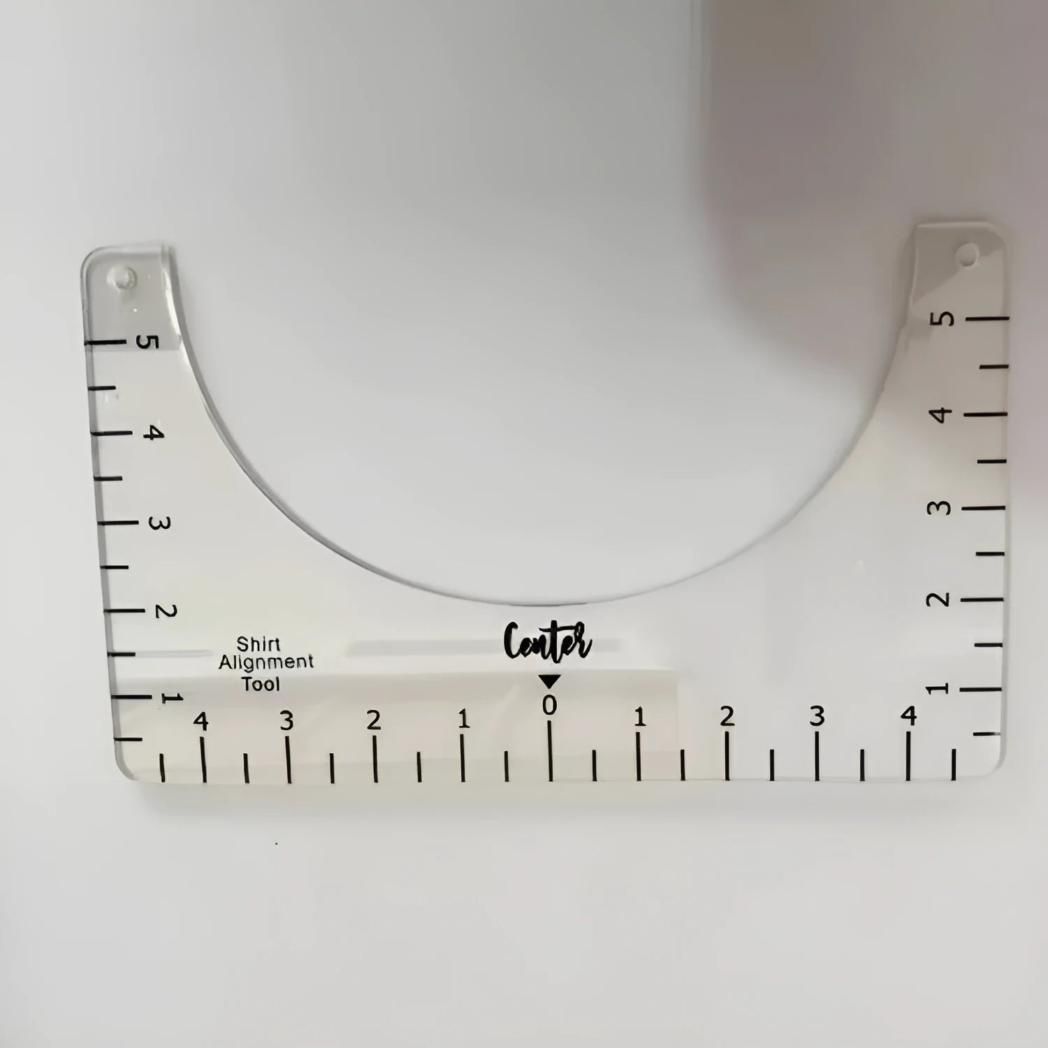 Transparent acrylic sewing ruler patch for T-shirt alignment, 10x6 inches.