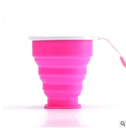 Collapsible stainless steel travel water cup showing expanded and compressed states