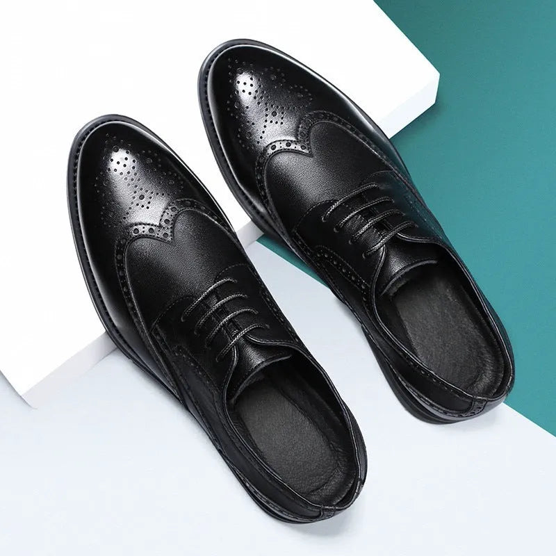 Men's black and brown brogue leather shoes with traditional perforated detailing