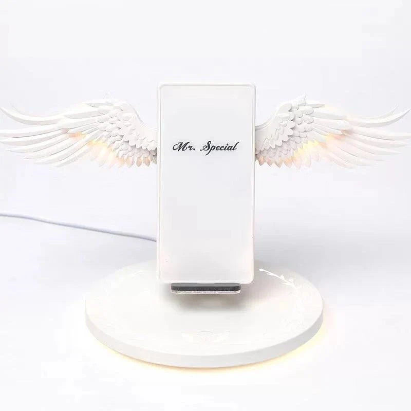 Angel Wings Wireless Charger with unfolding wings and aura base for fast 15W charging