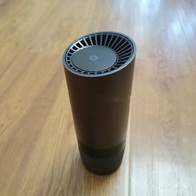 Black aluminium alloy car air purifier with push button controls