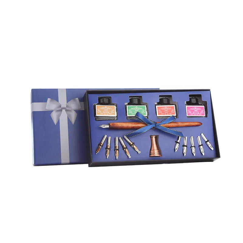 Wooden dip pen calligraphy gift set with coloured ink bottles in a storage box.